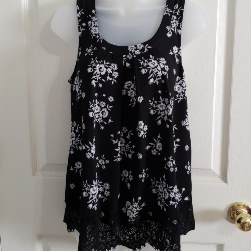 Black tank top with white flowers
